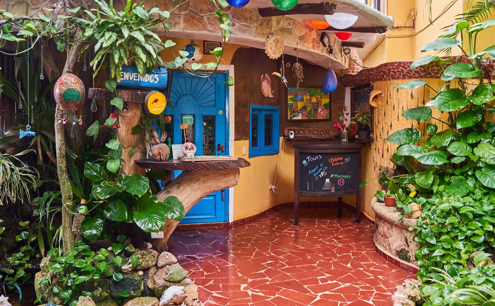 Maison Tulum: inner garden with red tile floor